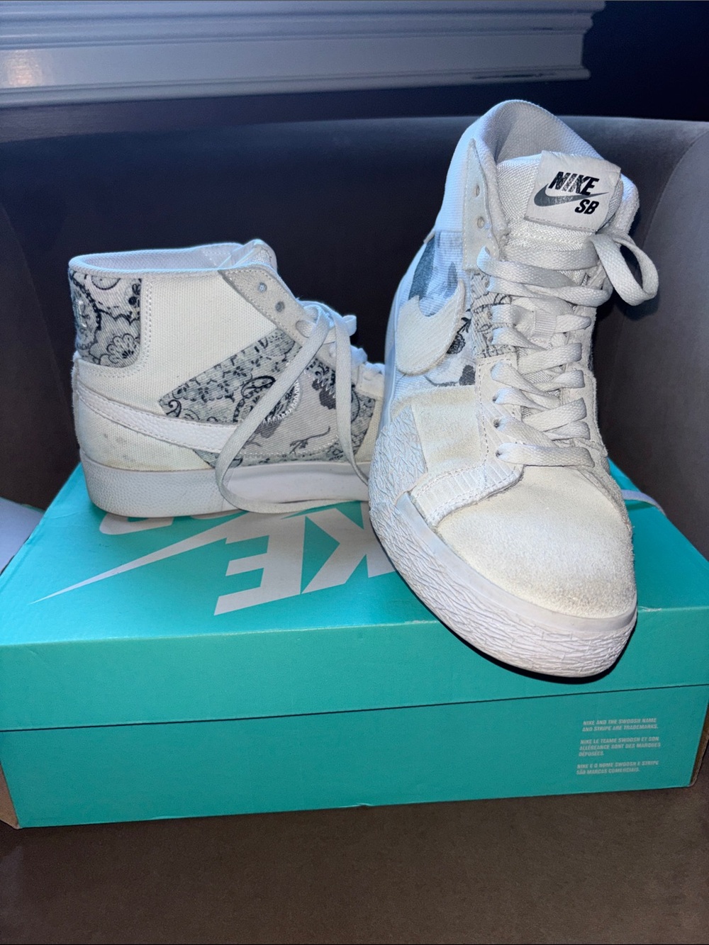 Nike SB White High-Top Sneakers with Black Paisley Panels